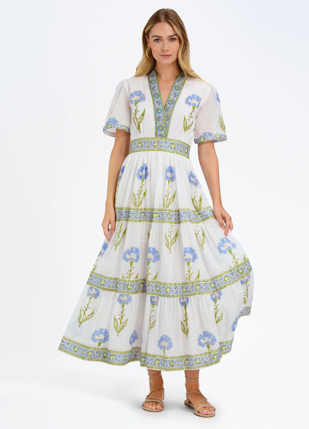 Erin Dress in Nicole Blue, front view, holding the skirt out