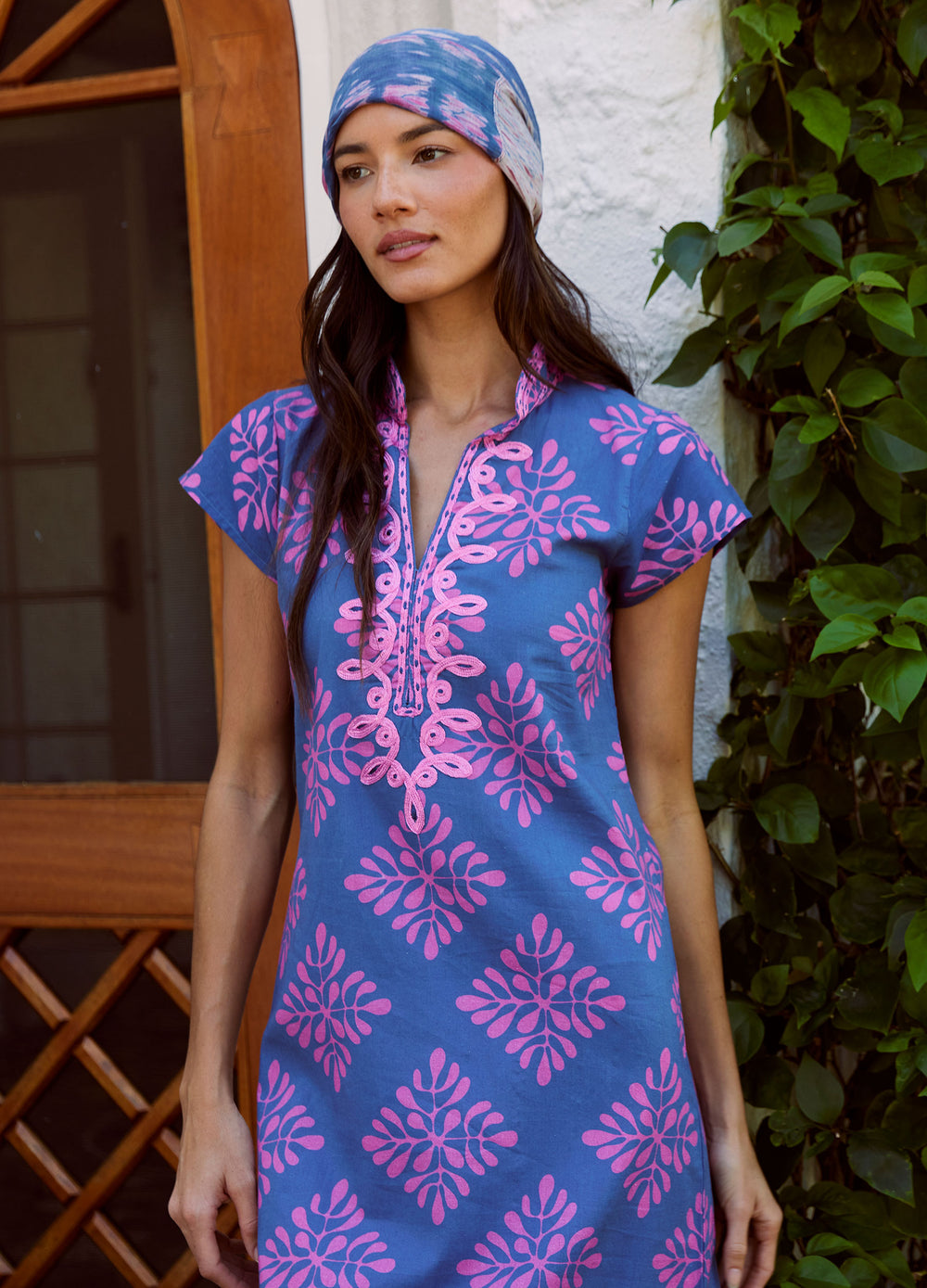 Lana Cap Sleeve Caftan in Diamond Print Navy, closer front view by a window