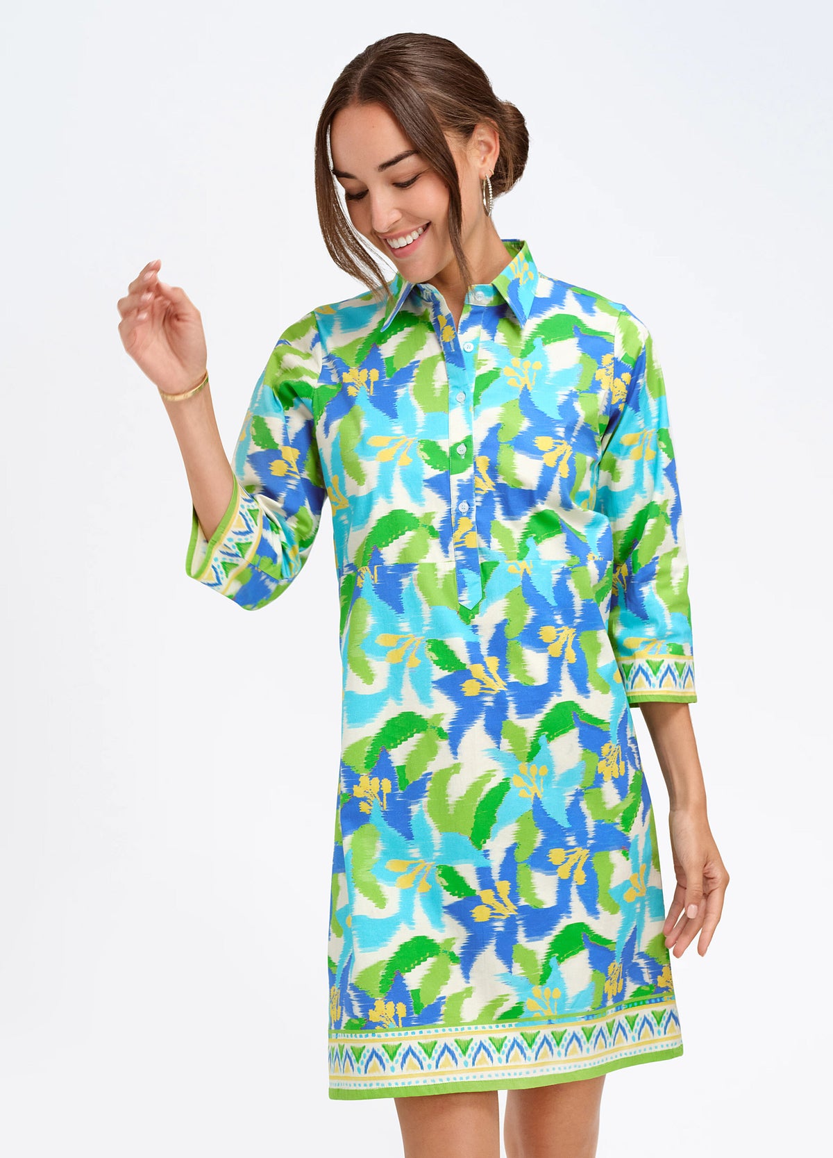 Charlie Dress in Lily Blue, closer front view, hand raised