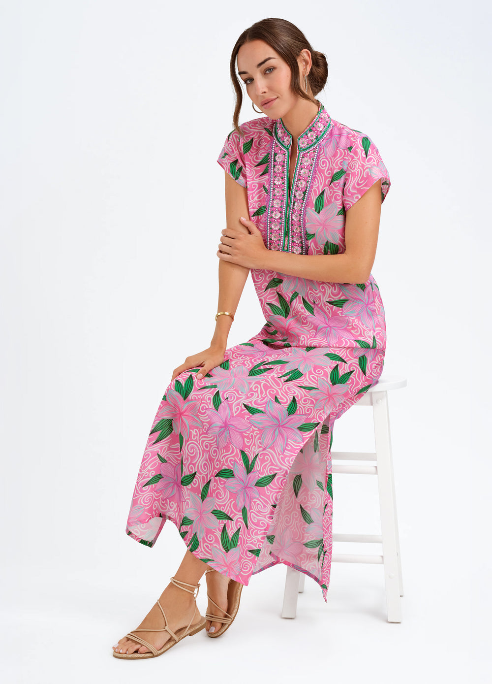 Lana Cap Sleeve Caftan in Maui Pink, seated on a stool