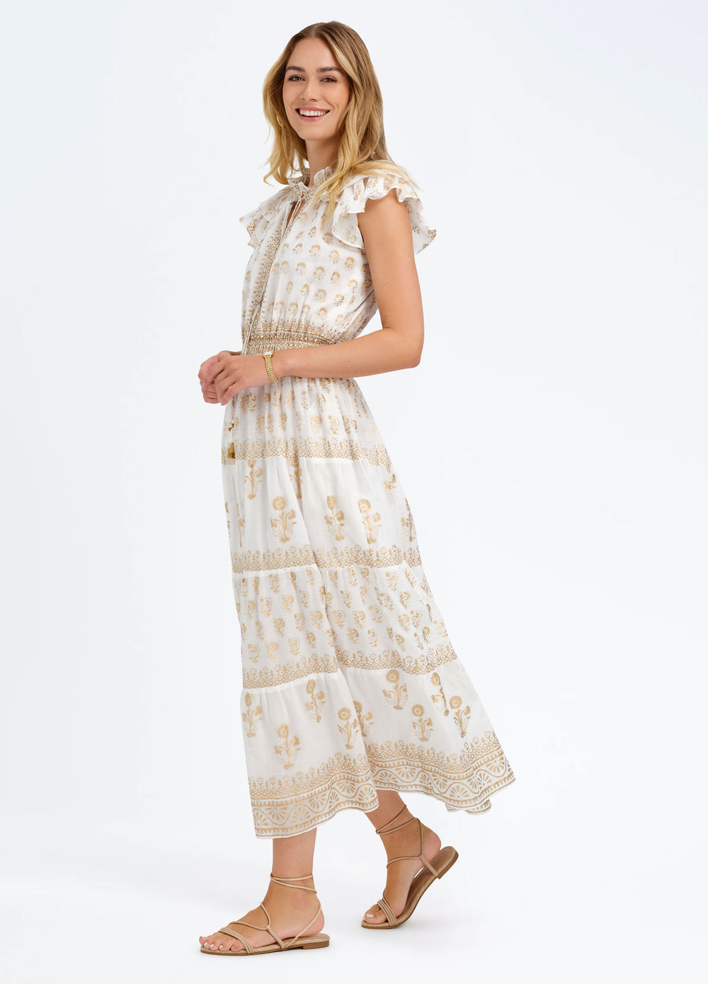 Liz Dress in Ophelia Gold, three-quarter view, walking