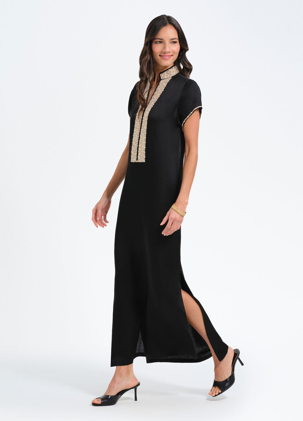 Pearl Cap Sleeve Caftan in Black, three-quarter view, walking