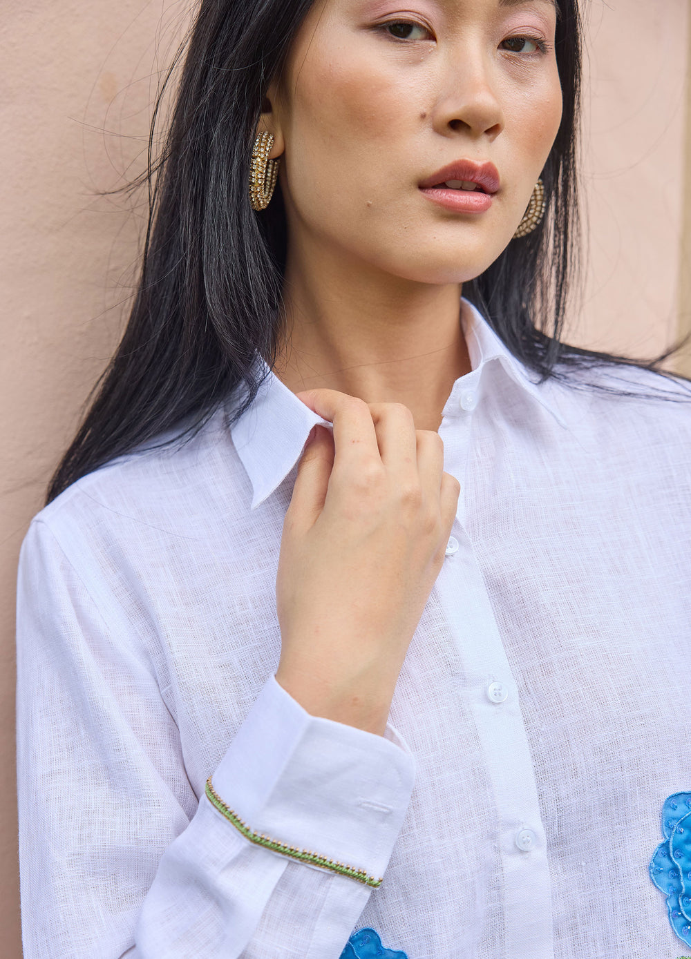 Sheer Flower Shirt in Blue, closer view, hand at the collar