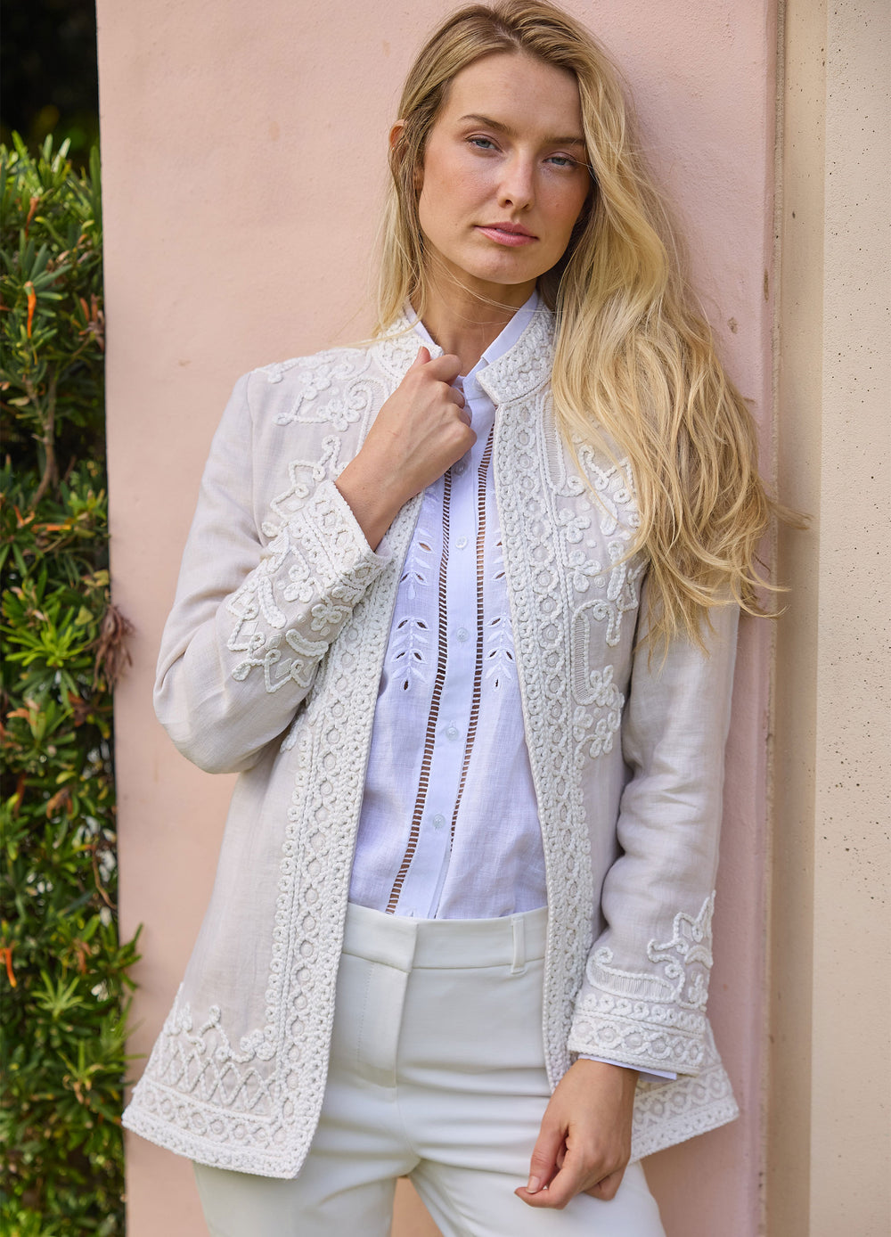 Ceci Jacket in Almond, front view, hand at the collar