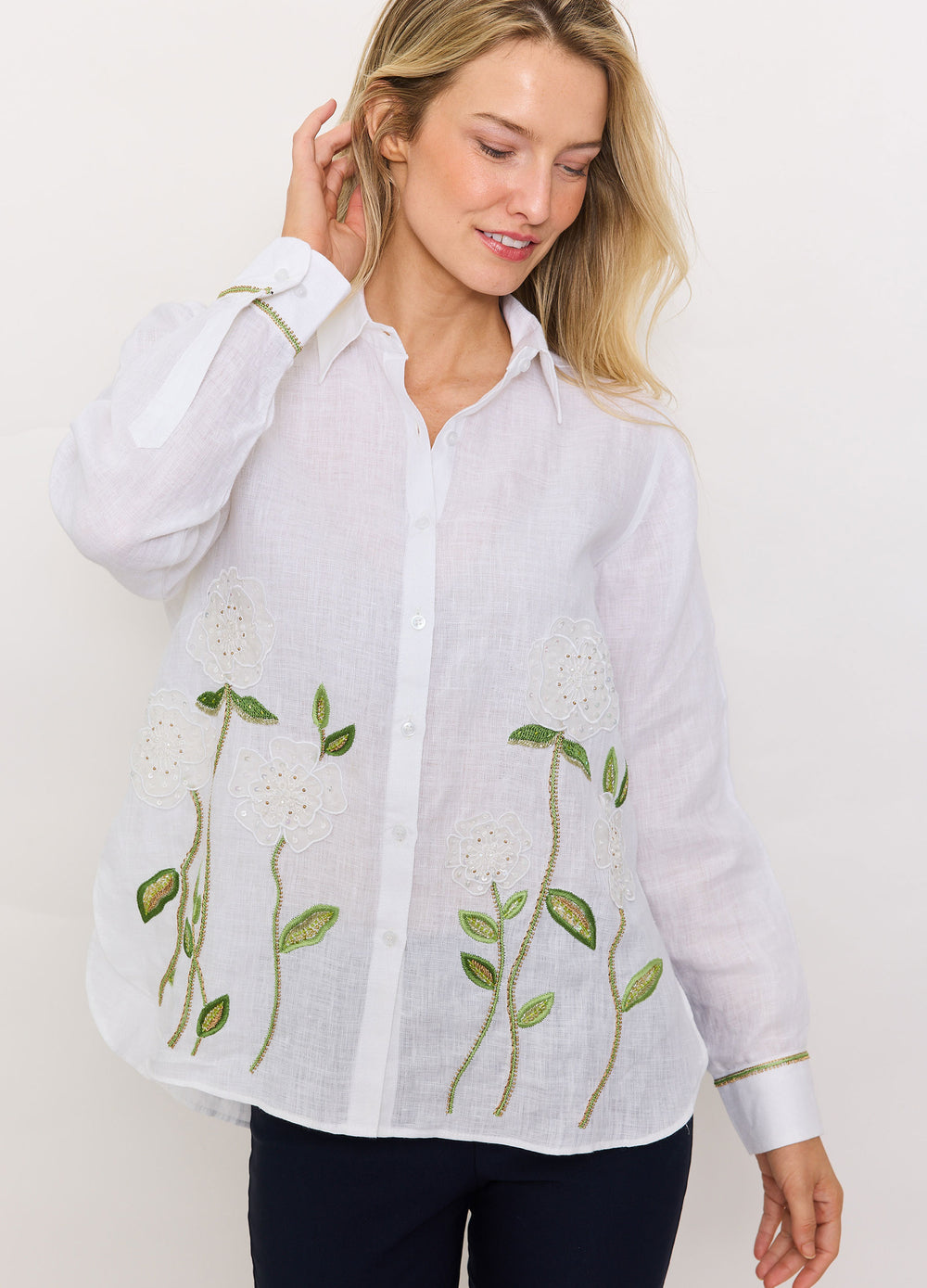 Sheer Flower Shirt in White, three-quarter view, hand at the hair