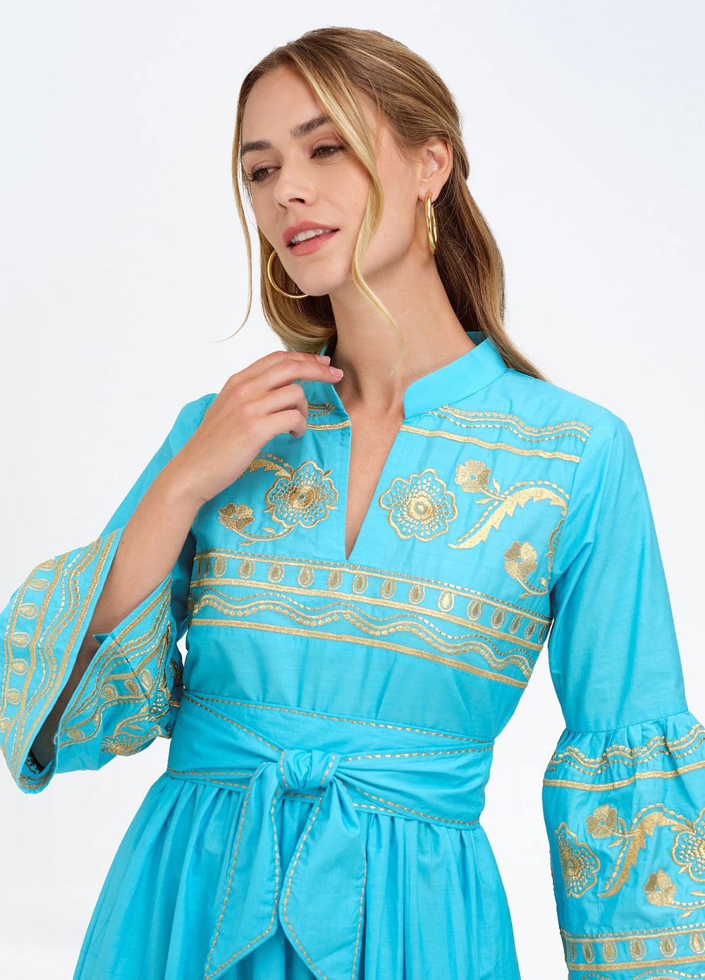 Elena Dress in Turquoise, close-up of the embroidered bodice and sash
