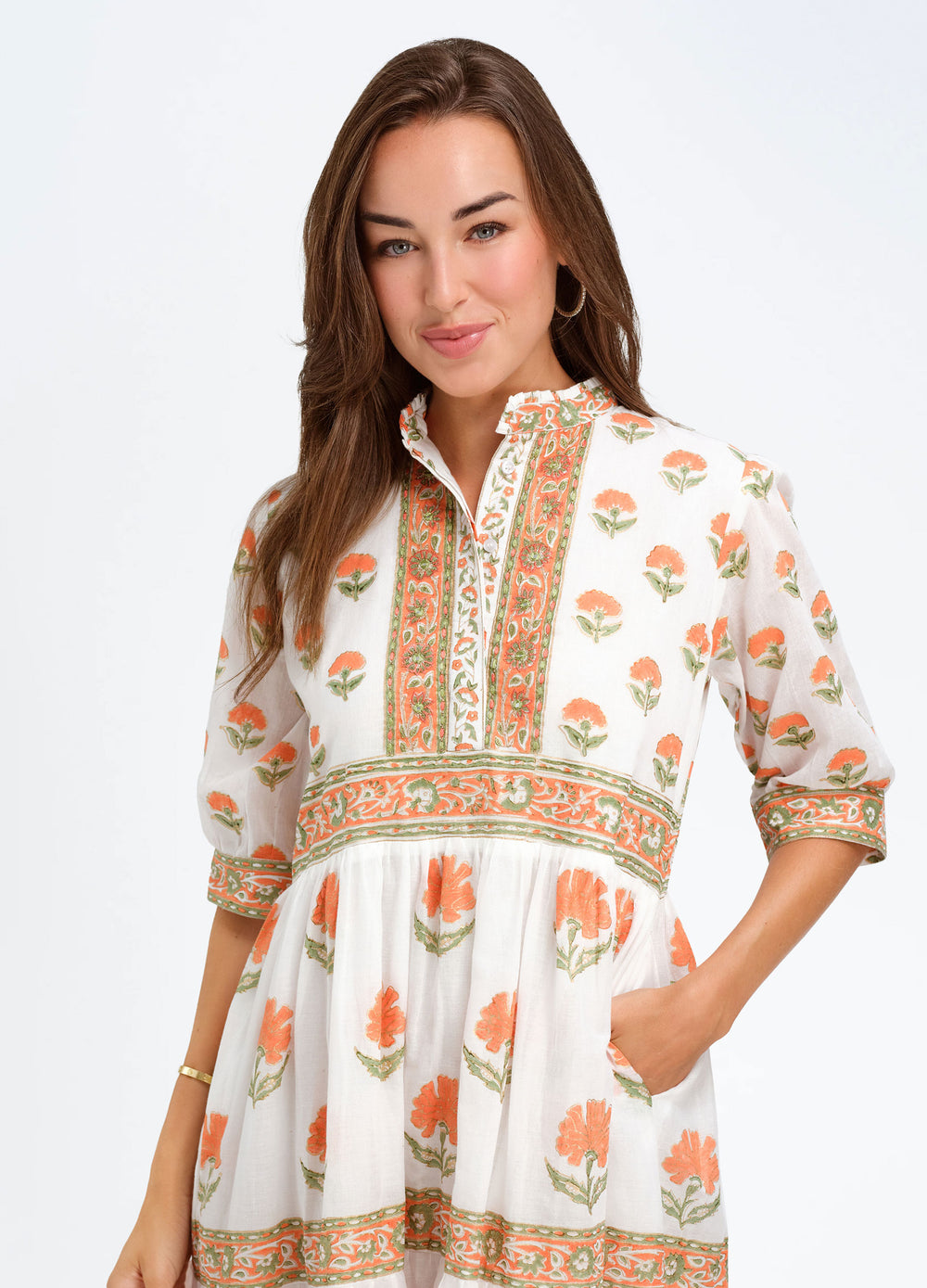 Wrenn Dress in Nicole Coral, closer front view, hand in pocket